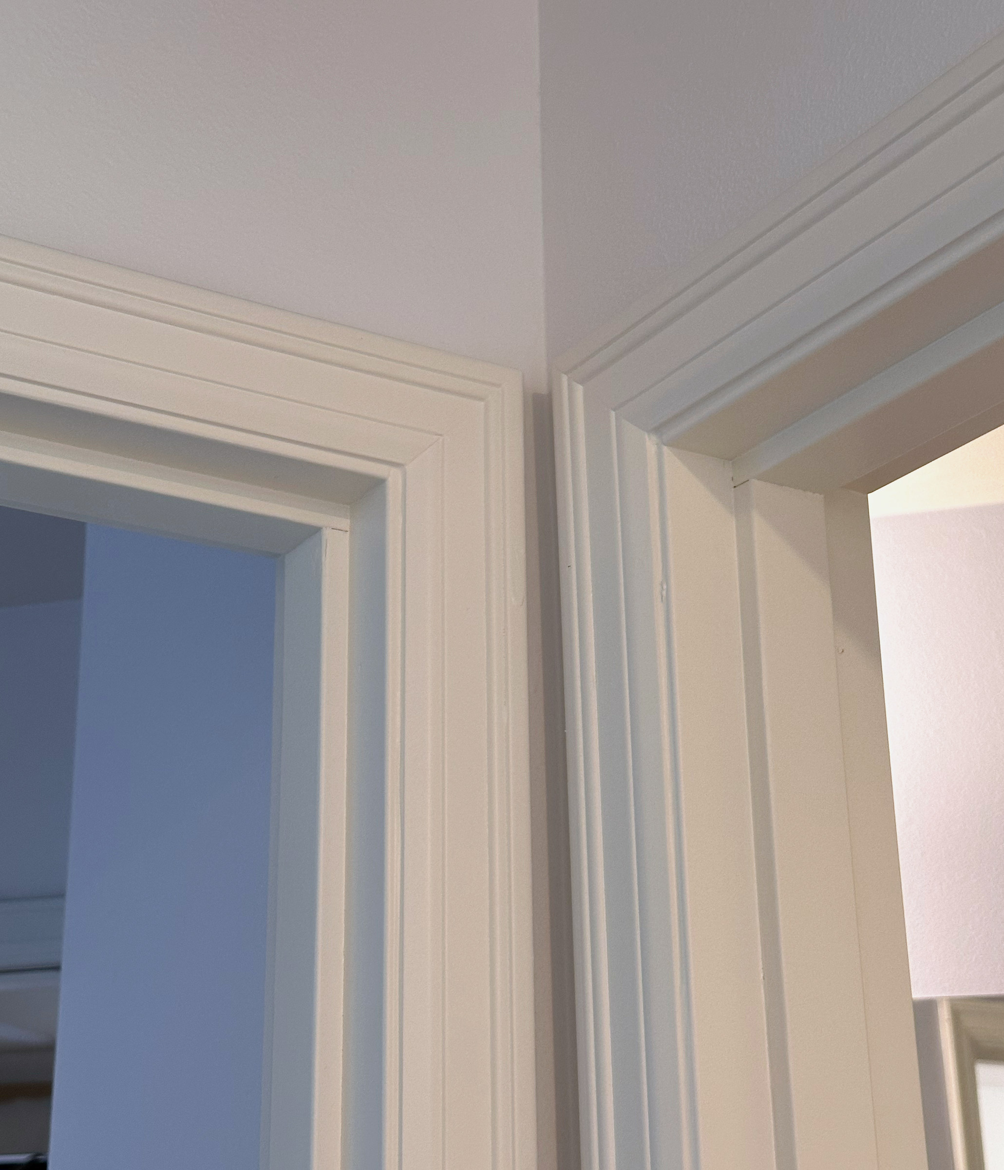 Detail of white door casings and interior trim.